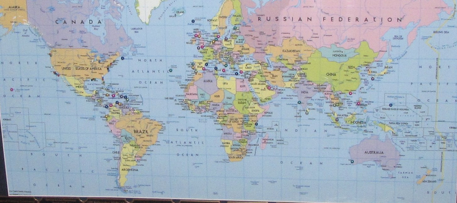 World map marked with pins showing places visited